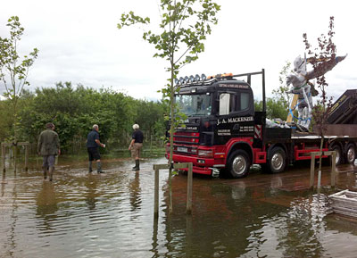 Crane assisted haulage for heavy sculpture